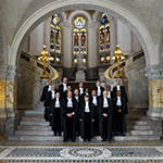 Members and Registrar of the International Court of Justice at the foot of the grand staircase of the Peace Palace in June 2023.