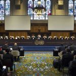 The Members of the International Court of Justice (ICJ) pictured on 11 November 2013 during the delivery of the Judgment in the case concerning the Request for Interpretation of the Judgment of 15 June 1962 in the Case concerning the Temple of Preah Vihear (Cambodia v. Thailand) (Cambodia v. Thailand), under the presidency of H.E. Judge Peter Tomka.