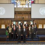Official visit of the United Nations Security Council to the International Court of Justice (ICJ) on Monday 11 August 2014. Official photograph of Members of the Court, the Registrar of the Court and the Security Council at the foot of the Bench in the Great Hall of Justice, where the ICJ holds its public sittings. Front row, from left to right: H.E. Sir Mark Lyall Grant (United Kingdom), President of the Security Council, H.E. Mr. Peter Tomka, President of the International Court of Justice. Second row, from left to right: H.E. Judge Joan Donoghue, H.E. Mr. Cristián Pedro Barros Melet (Chile), H.E. Judge Christopher Greenwood, Mr. Olivier Jean Michel Maes (Luxembourg), H.E. Judge Giorgio Gaja. Third row, from left to right: H.E. Ms Raimonda Murmokait? (Lithuania), H.E. Mr. Philippe Couvreur, Registrar of the ICJ, H.E. Mr. Mahamat Zene Cherif (Chad), H.E. Judge Julia Sebutinde, H.E. Ms Dina Kawar (Jordan), H.E. Mr. Oh Joon (Republic of Korea). Back row, from left to right: Ms Diarra Dime-Labelle (France), Mr. Michael Bliss (Australia), Mr. Mario Oyarzábal (Argentina), H.E. Jean Pierre Karabaranga (Rwanda), Mr. Alexander Pankin (Russian Federation), Mr. Zhao Yong (China) and Mr. Mark Simonoff (United States).