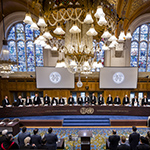 The Members of the Court on the first day of the hearings