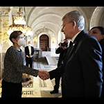 H.E. Judge Joan E. Donoghue, President of the International Court of Justice, greets H.E. Mr. Šefik Džaferović, Chairman of the Presidency of Bosnia and Herzegovina, and his retinue, in the entrance hall of the Peace Palace, seat of the Court   