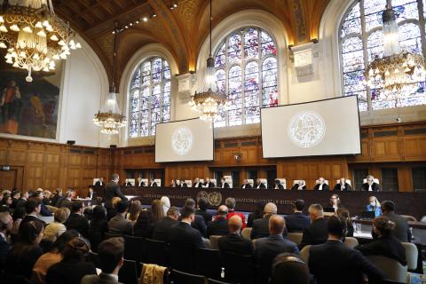 The Members of the Court on the opening day of the hearings. 