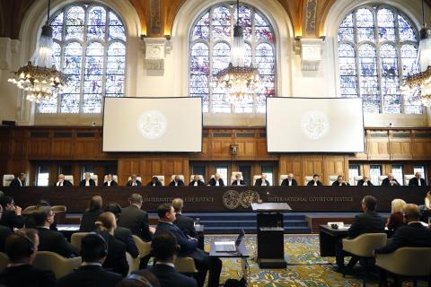 The Members of the Court on the opening day of the hearings.