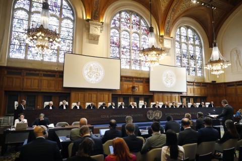 The Members of the Court on the second day of the hearings.