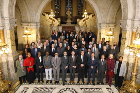 Group photo of the diplomatic representatives with HE Mr Philippe Gautier, Registrar of the International Court of Justice, and HE Mr Marcin Czepelak, Secretary-General of the Permanent Court of Arbitration