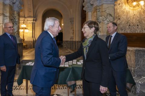 HE Judge Joan E. Donoghue, President of the International Court of Justice, greets HE Mr Alberto van Klaveren Stork, Minister of Foreign Affairs of Chile, and his delegation, in the entrance hall of the Peace Palace, seat of the Court 