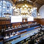  Members of the Court at the start of the hearings